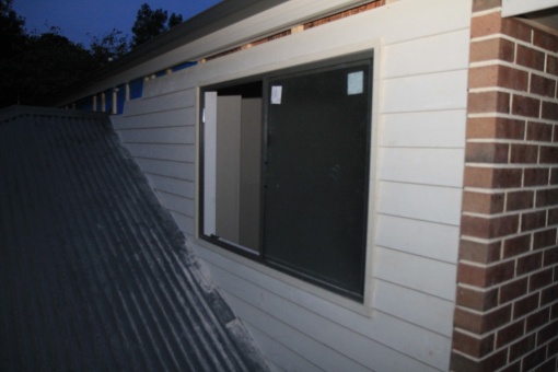 Weatherboard cladding at the rear of the house.