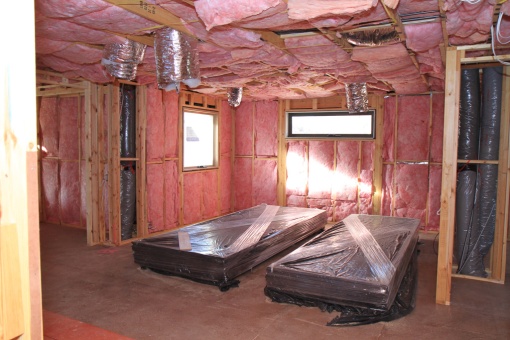Very pink room - this one is of the upstairs leisure.  The two black items are plaster boards.